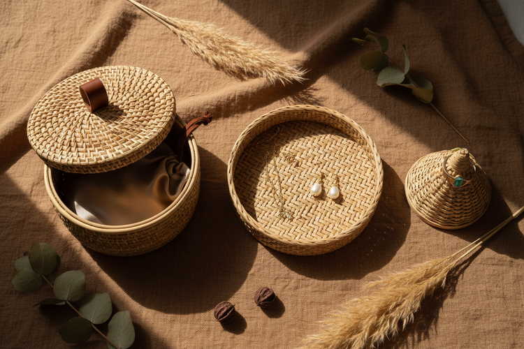 Handwoven keepsake vessels and jewelry organizers styled on linen, crafted by artisans in India — GrassCrafts Earth Edit collection