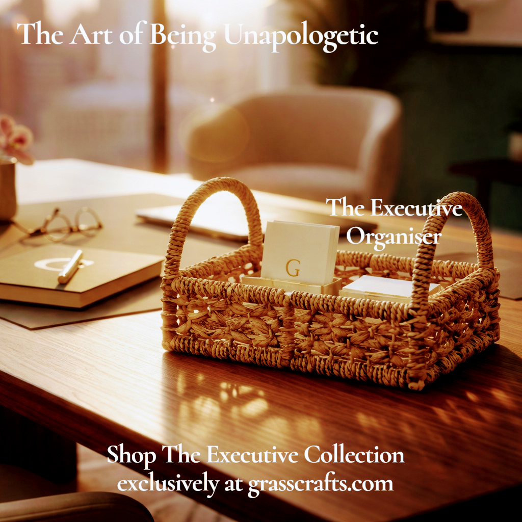 Woven organizer or basket on a desk with office supplies, blurred background. Water hyacinth.