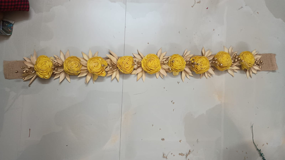 Handmade yellow rose and gold dry flower toran on a jute base, 3 ft